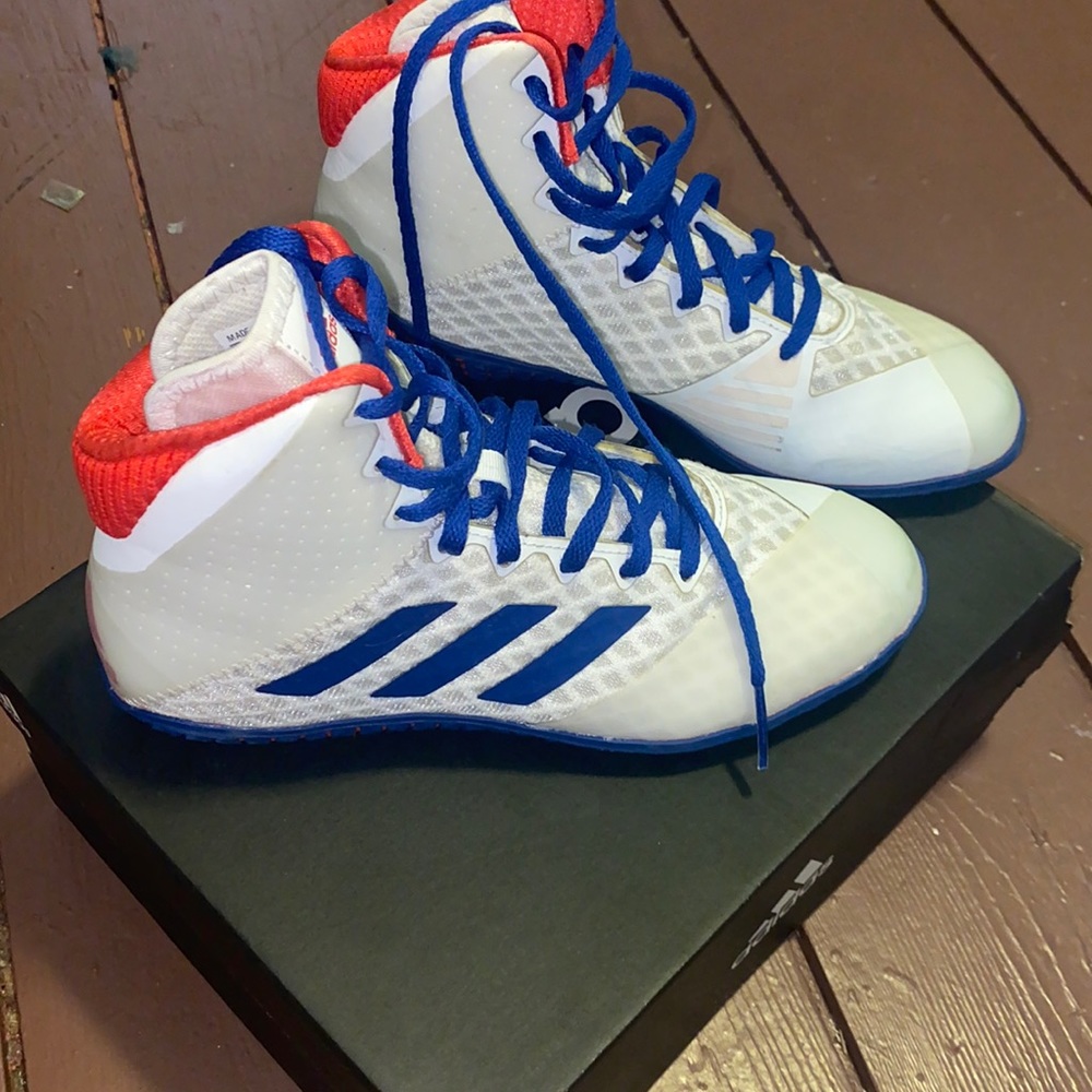 Red white and blue adidas wrestling shoes